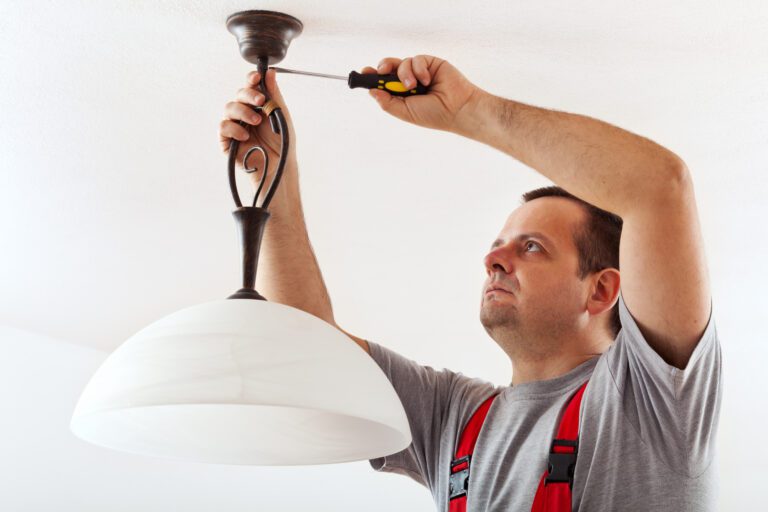 Electrician Mounting Ceiling Lamp